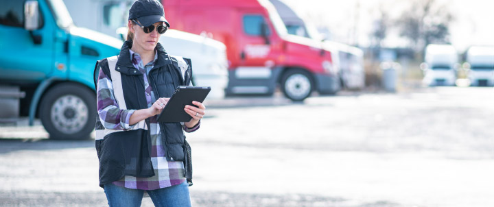 Driver looking at an iPad